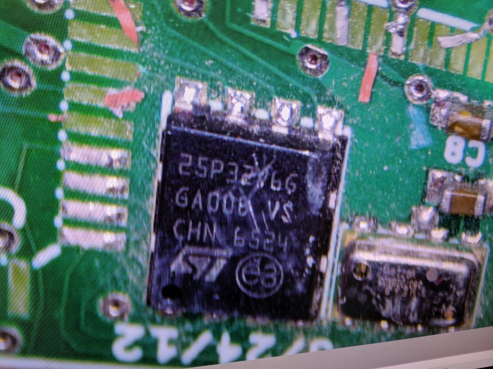 damaged SPI flash chip on the board